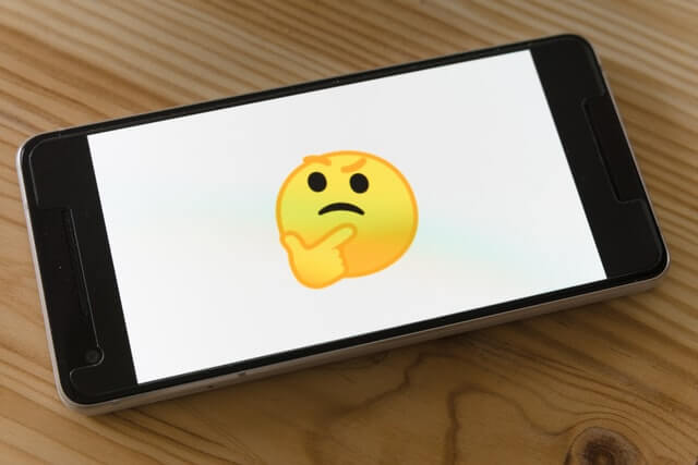 thinking emoji on mobile phone